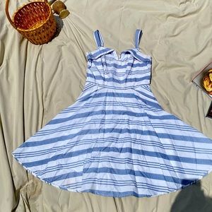 Gorgeous striped sundress with light blue stripes and pockets and flattering fit